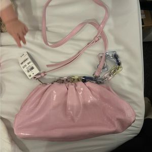 Selling pink INC clutch style bag